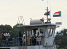 Barge with North and South flags Barge with North and South flags